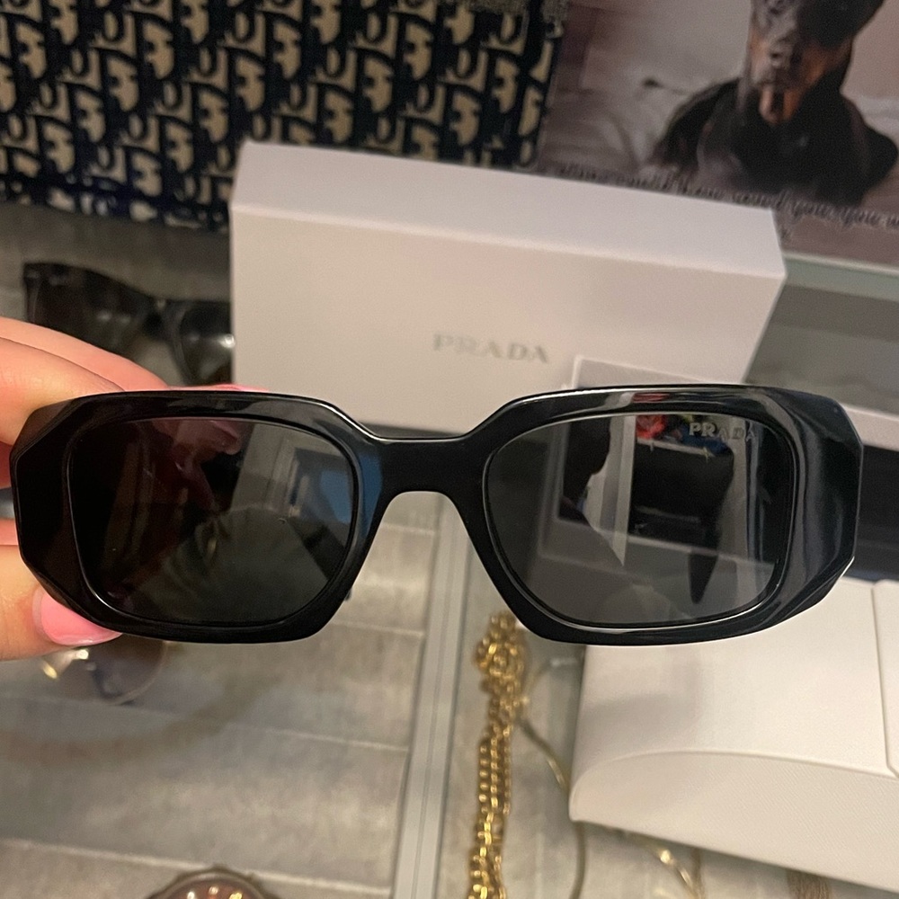 Brand new Authentic Prada sunglasses. Never worn. Case included.